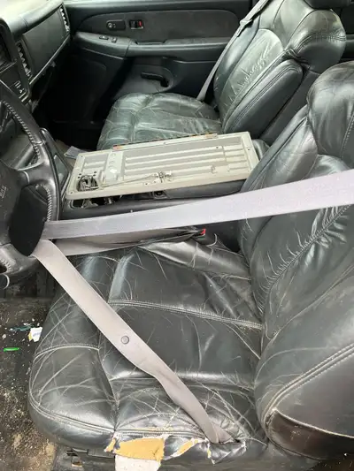 extended cab interior leather seats with console, comes with new d/s lower leather replacement cover...