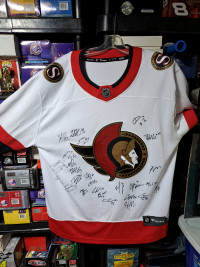 Ottawa senators team signed jersey.