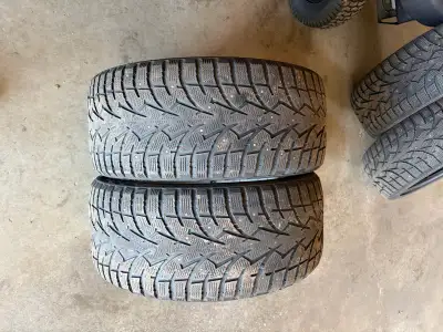 2 sets of tires. Studded. One set is 245/40/R18. One set 225/40R18. Toyo.