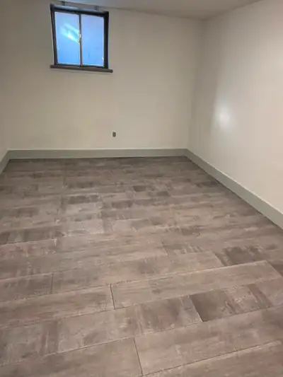 -Fully Renovated Half Basement - Everything included (heat, hydro, water, etc.) - 1 Bathroom with si...