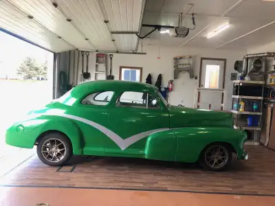 48 Coupe, 350 crate engine with 700 overdrive transmission. Custom heavy metal flake paint job, new...