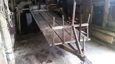 I have for sale a homemade built wood trailer built on a real 5 ton truck frame very heavy duty used...