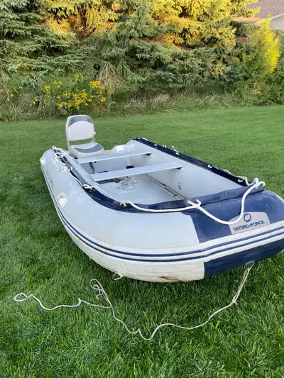 Hard bottom inflatable, no leaks, all equipment included. Good for 30hp motor. Safety kit, paddles,...
