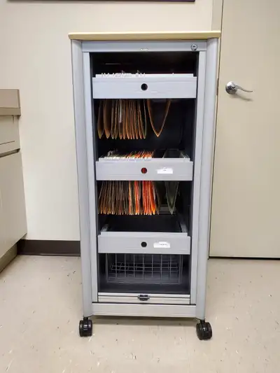 Filing cabinet, sliding door, with wheels $550, View more