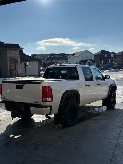 I have a 2013 GMC Sierra 1500 SLT (fully loaded trim level, power seats, power mirrors, full leather...