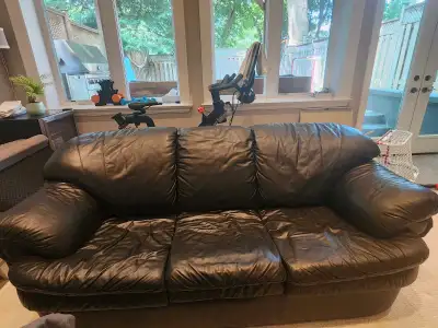 Black leather couch, View more