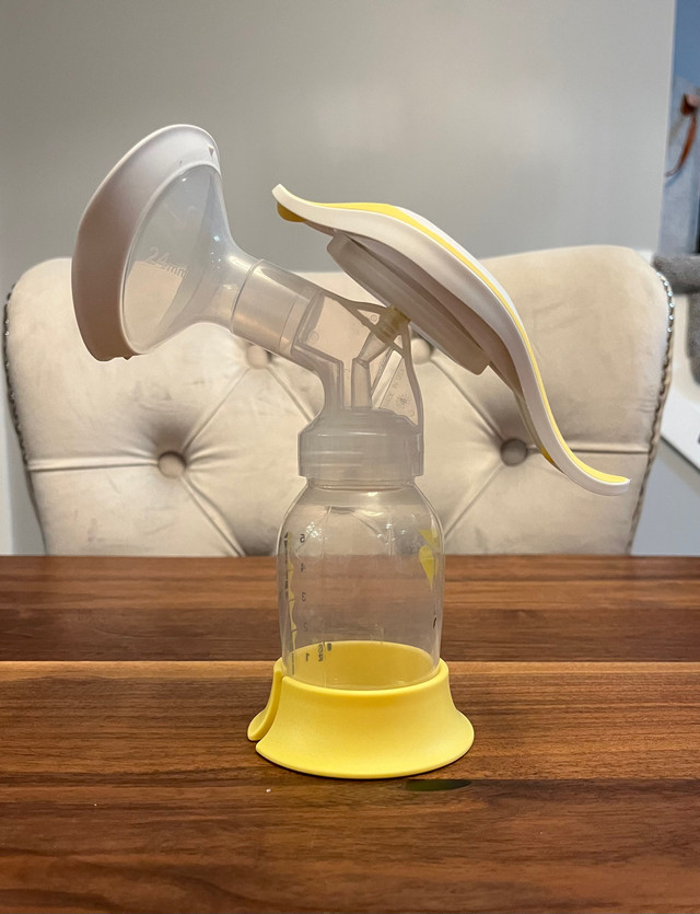 Medela hand pump in Feeding & High Chairs in St. Catharines