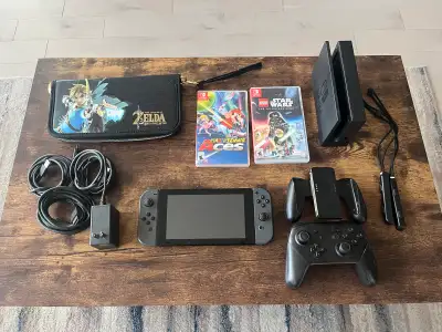 Nintendo Switch V1 (with Pro Controller, 2 games, 2 joycons), View more
