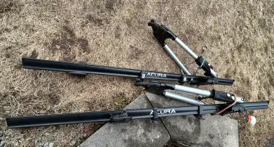 These Acura roof top bike racks are designed to securely transport your bicycles, providing a conven...