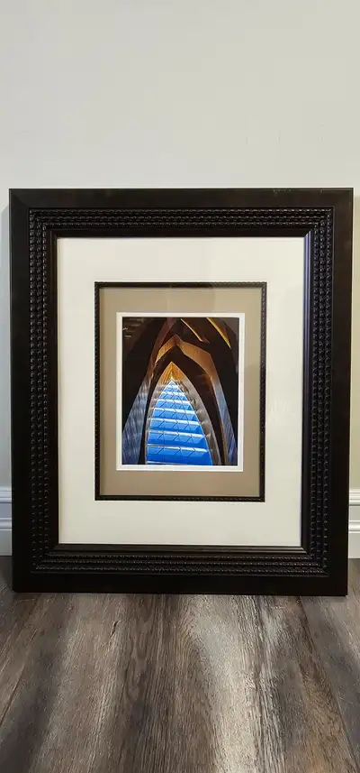 Framed Calgary Library Photograph – 21” x 25” – Matted & Glass Covered Capture the architectural bea...