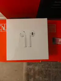 Brand new unopened apple airpods with charging case 2 generation