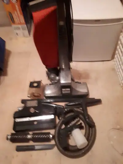 This reliable, pre-owned Kirby Heritage heavy-duty upright vacuum cleaner comes with a variety of at...