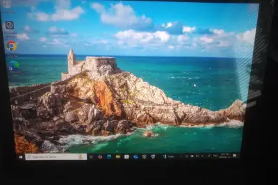 Offering a preowned Dell Latitude touchscreen laptop computer with Intel(R) Core(TM) i5-10310U CPU @...