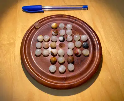 Wood base with polished stones.