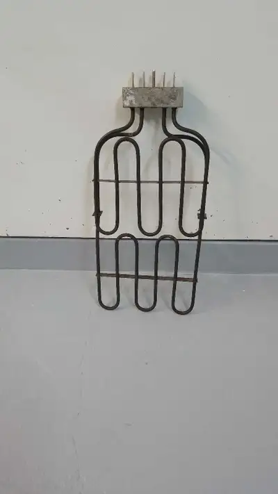 Voici un élément de gril usagé pour les cuisinières et fours Jenn-Air. Il est en état de fonctionnem...