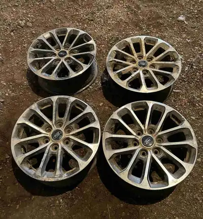 Ford Factory Rims $200 18inch 6 bolt aluminum rims 1 is bent in pictures Located in Melville