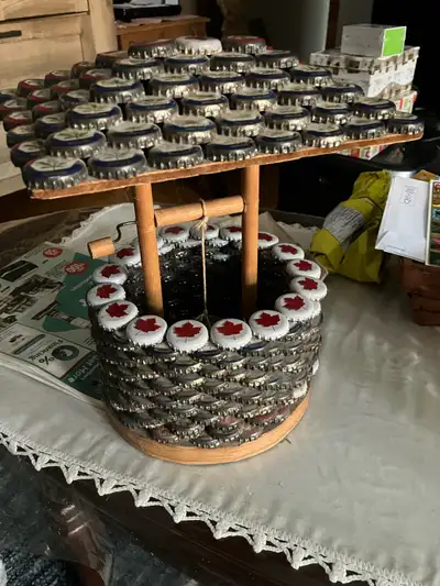 Molson Canadian beer cap wishing well. Needs some sprucing but intact