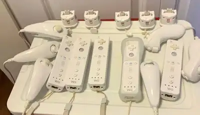 Original Nintendo Wii Controllers White Wiimotes 25$ Each Motion plus adaptors 15$ each Nunchuck 10$...