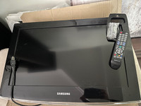 26" Samsung flat screen TV for sale with brackets