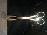449 E P Zinc of Italy Silver-plated Ice Salad Tongs $5.00
