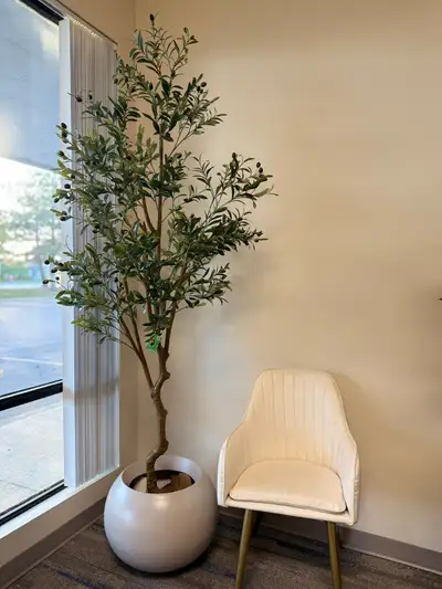 Add timeless Mediterranean charm to your space with our premium artificial olive trees. Designed wit...