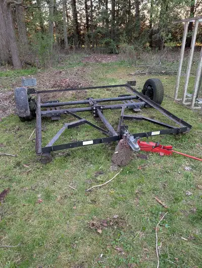 Home made car dolly. Tows great no issue. Also has home made ramps, spare tire, and magnetic lights....