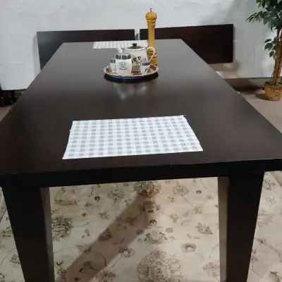 Selling a massive solid pine dining table in a modern "Parsons" style with a dark espresso finish. T...