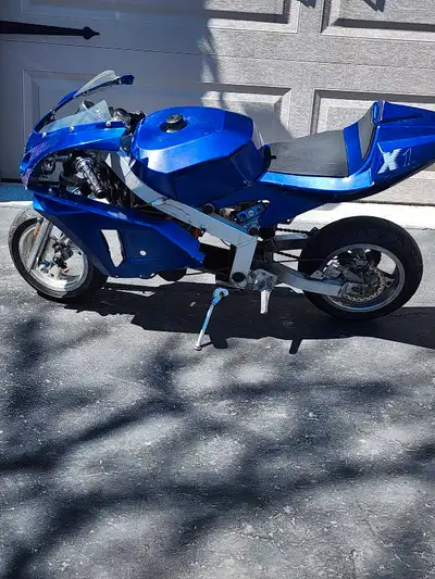 Runs and Rides Great. 100cc. Starts up right away. Has a brand new pull start and carburetor. It has...