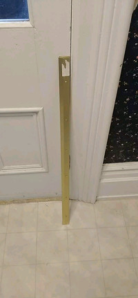 Transition strips for doorways  gold colored