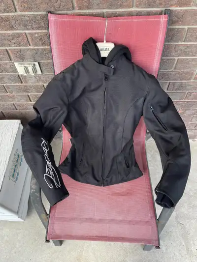 Armoured motorcycle jacket for small frame woman. Was worn by teen boy as passenger and no longer fi...