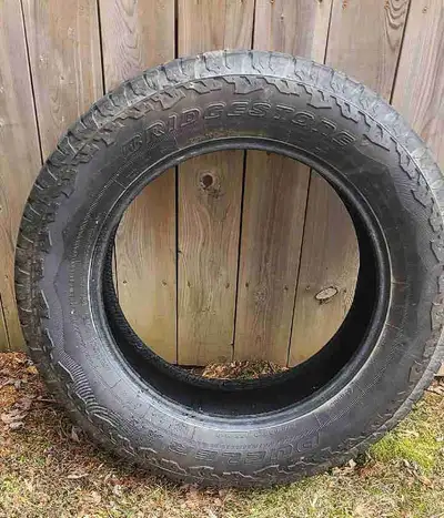 Set of Bridgestone Dueler A/T RH -S. Size is 275/60R20. Tread depth as shown is 15/64. $750. Cash on...
