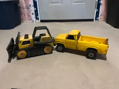 Vintage metal (original paint) Tonka pick up truck and bull dozer. $40 for each