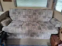 Small RV couch that folds into a bed, my 6 ft son said it as com