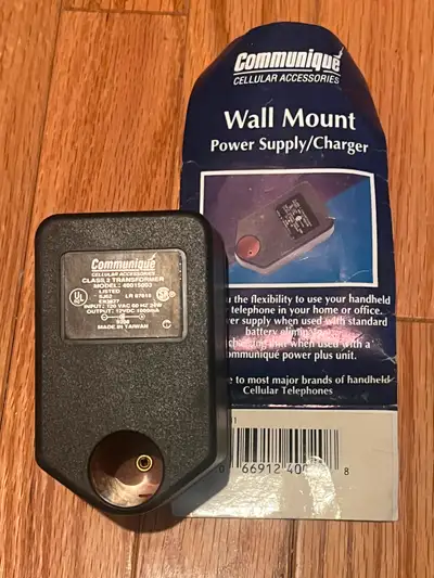 Wall mount adapter to any cell phone adapter or other items to supply 12V power rounded. 1 amp capac...
