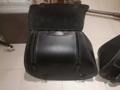 I have a set of hard leather saddle bags that came of my vtx 1300. The brackets are included. They c...