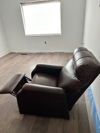 Like new  brown leather  reclinable sofa/ lazyboy