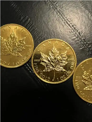 Looking to start reducing my gold collection. Looking to sell the world famous Maple Leaf Gold Coins...