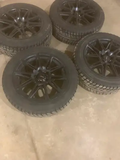 Set or 4 winter tires on rims, lots of tread left, came off mitchibushi outlander, nuts included