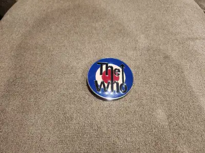 I am selling a, The Who belt buckle. Message me interested.