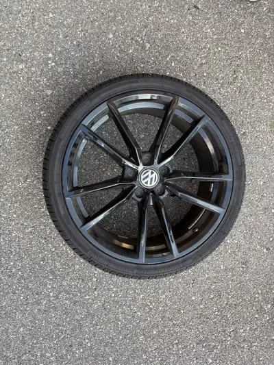 I'm selling a set of four Volkswagen Golf R rims with tires, size 235/35R19, in used condition. Spec...