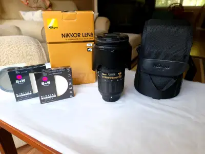 Nikon F-mount lens With $300 worth filters Original box