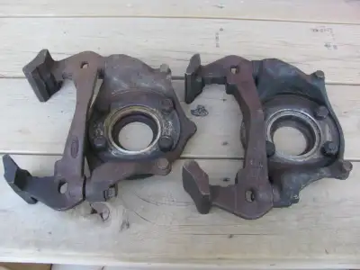 Ford 9 Inch Disc Brakes. Original Rear Axle Bearing Retainers, Bolts and Caliper Brackets from Linco...