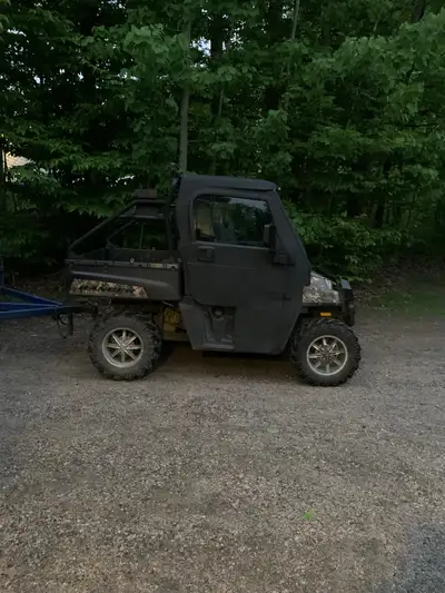 2010 Polaris Ranger in good condition. Fully enclosed custom made cab, one of a kind,roll down windo...