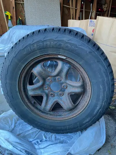 Used winter tires on rims. Were on Chevy Traverse. Hankook 245/70R17