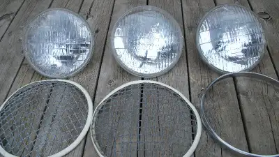 ** Datsun 510, black vinyl one piece rear floor mat, great condition, $65.** 3 round sealed beam hea...