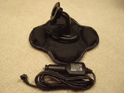 Garmin GPS Dash Mount + 12 Volt Charger, View more