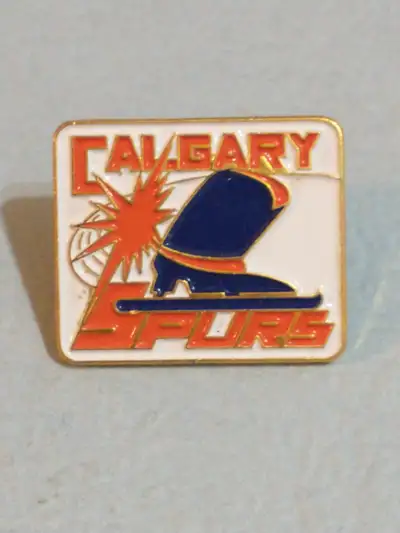 Beautiful AJHL Calgary Spurs defunct team hockey lapel pin, View more