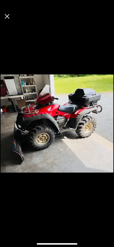 2005 Honda RINCON 650 cc’s 14850 km 27” mud bug tires Plow w/winch Heated handgrips Box included Rea...