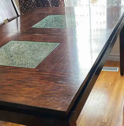 Dining table with „shattered glass look” inserts plus leaf for table expansion, 9 chairs with cream...