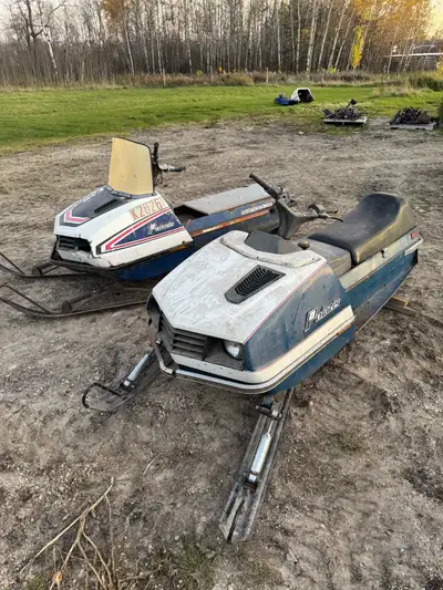 Two 1974 Electra snowmobiles one runs great,the other has no motor but is complete and is in beautif...